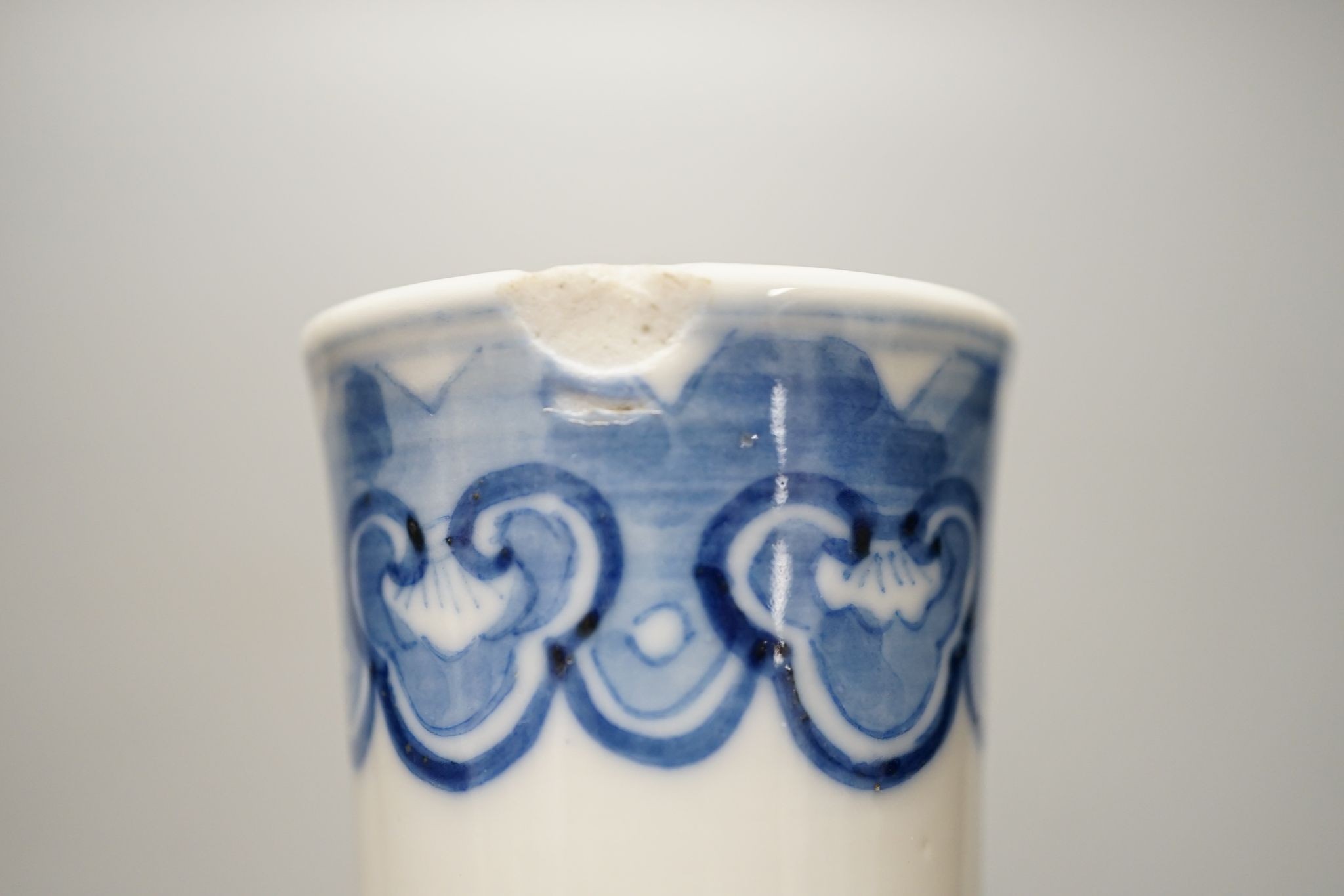 A Chinese blue and white bottle vase, Kangxi mark but 19th century. 25cm